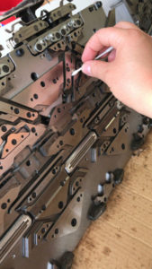 Cleaning the knitting machines