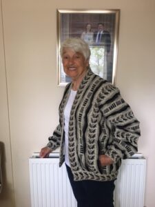 Nellie in a vintage Petal cardigan